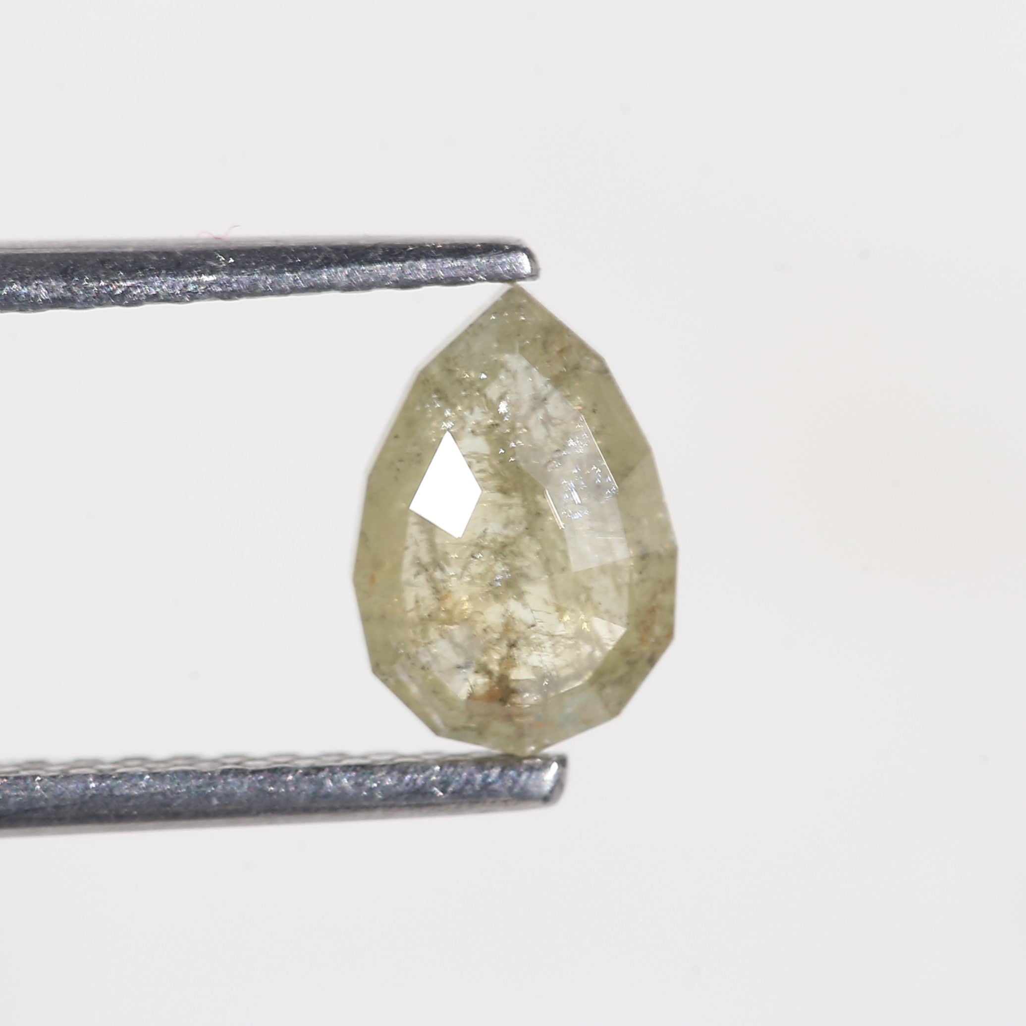 0.77 Carat Modified Pear Cut Salt and Pepper Diamond 7.65 MM