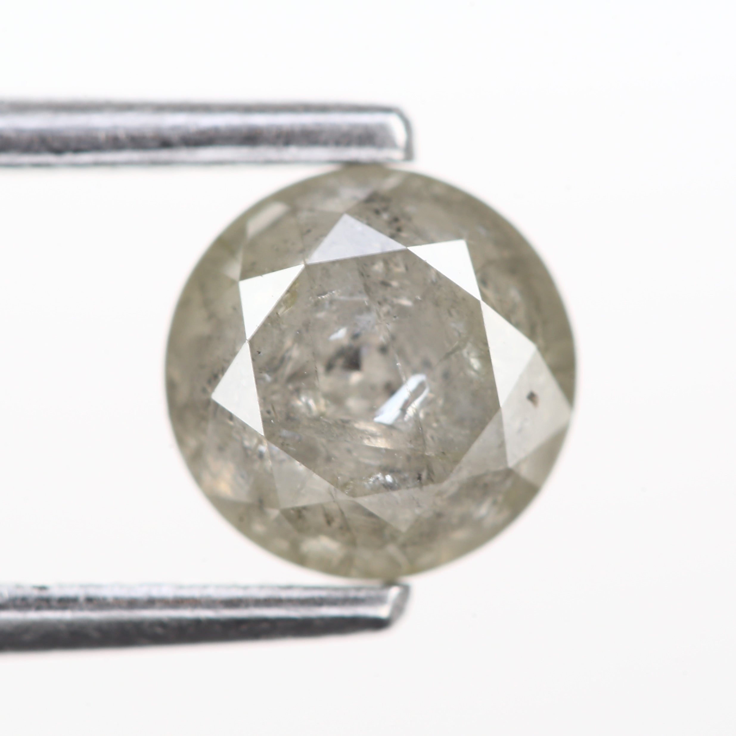 0.85 Ct Salt and Pepper Round Brilliant Diamond 5.5 MM with Natural Inclusions