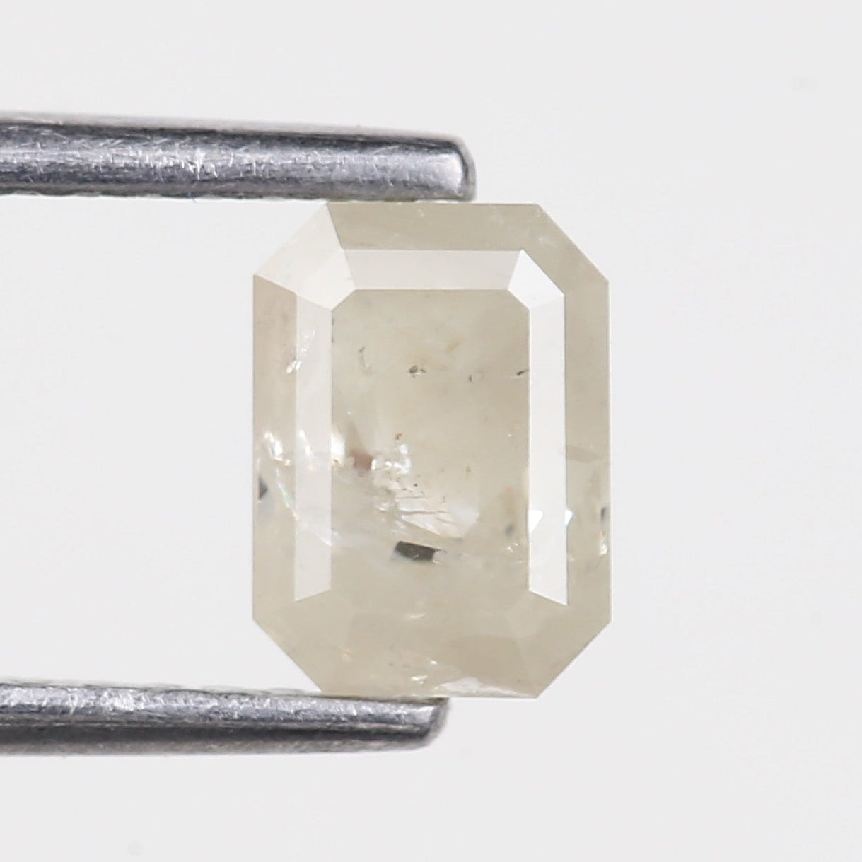 0.87 Carat Emerald Cut Salt and Pepper Diamond 6.37 MM