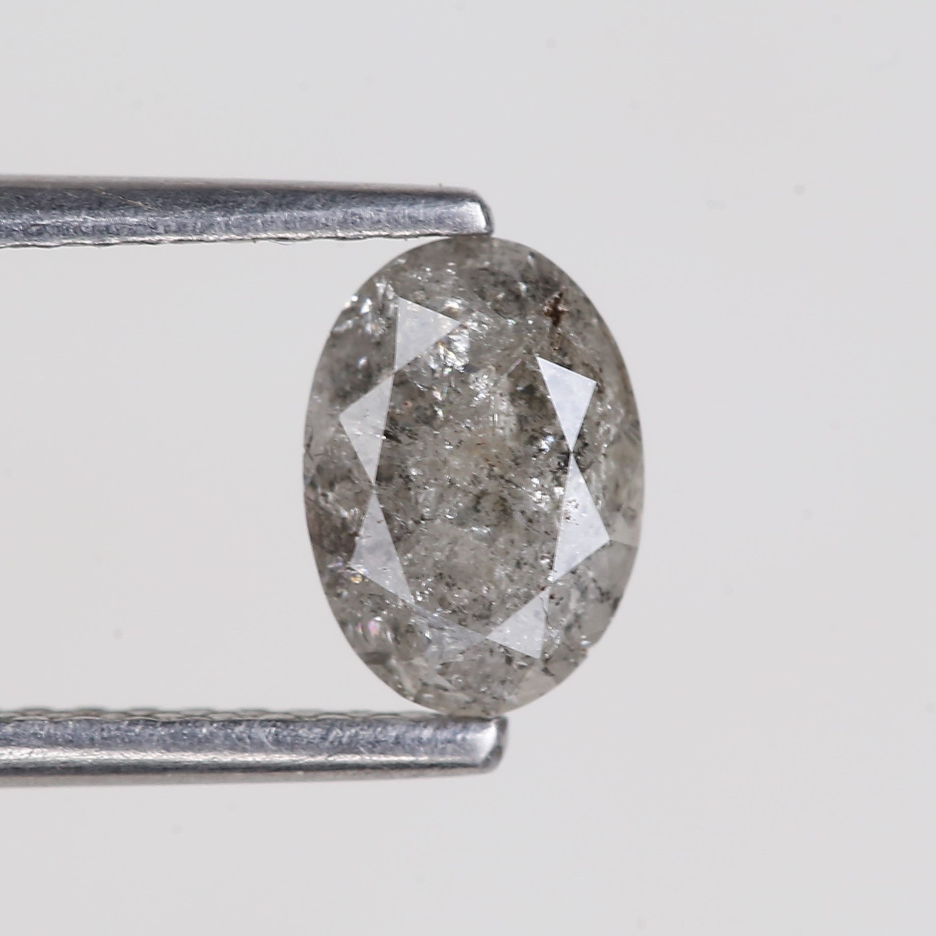 0.87 Carat Natural Grey Oval Cut Brilliant Salt and Pepper Diamond 7.06 MM