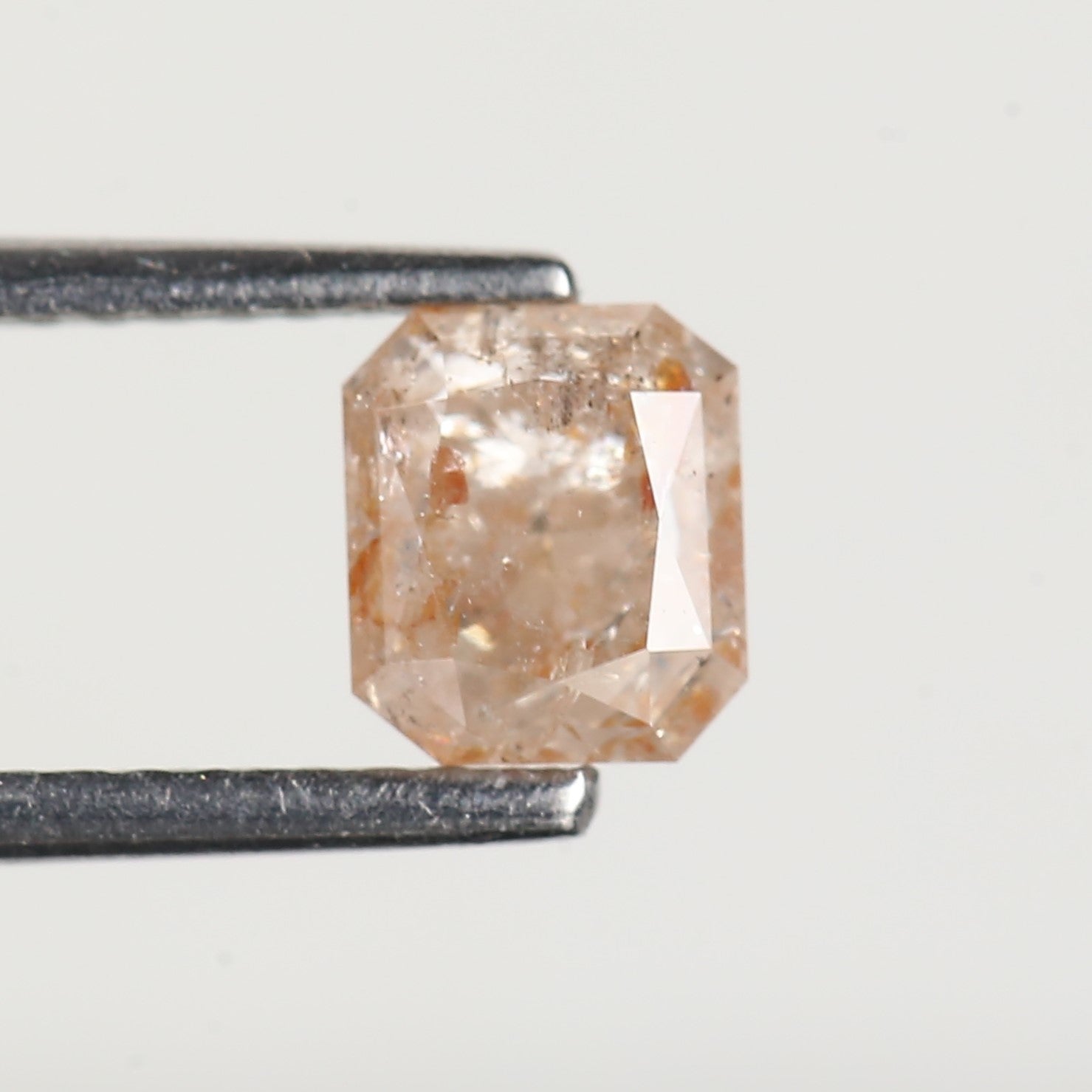 0.95 Carat Emerald Orange Salt and Pepper Diamond 5.6 MM
