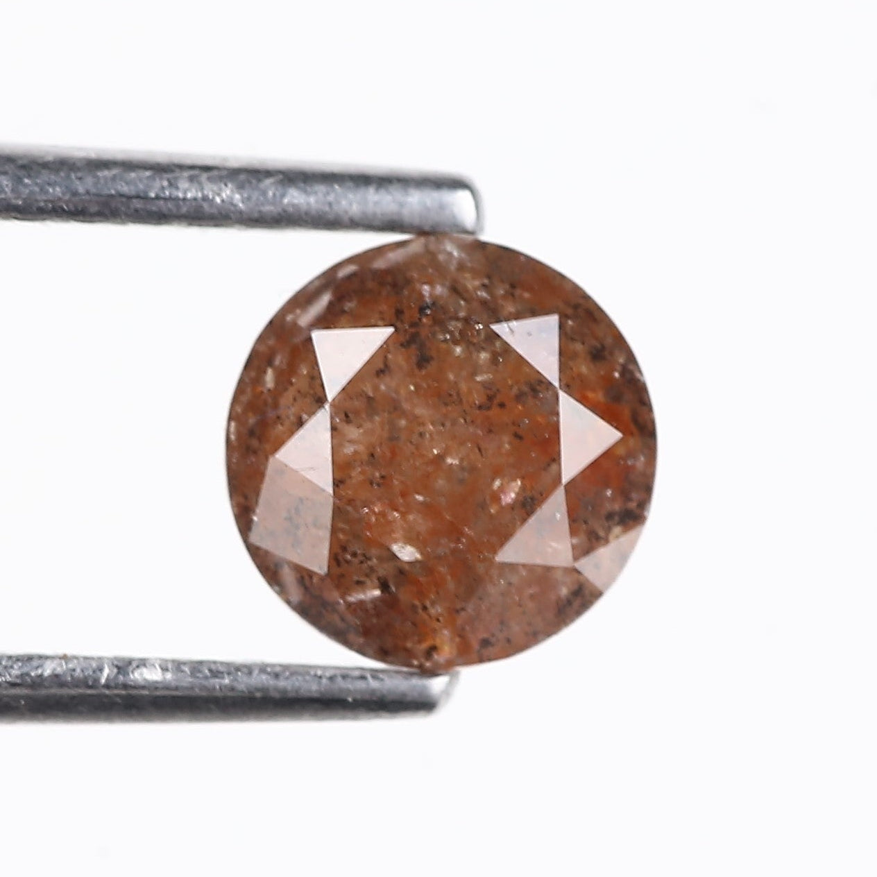 0.96 Carat Natural Reddish Orange Salt And Pepper Round Diamond 5.89 MM