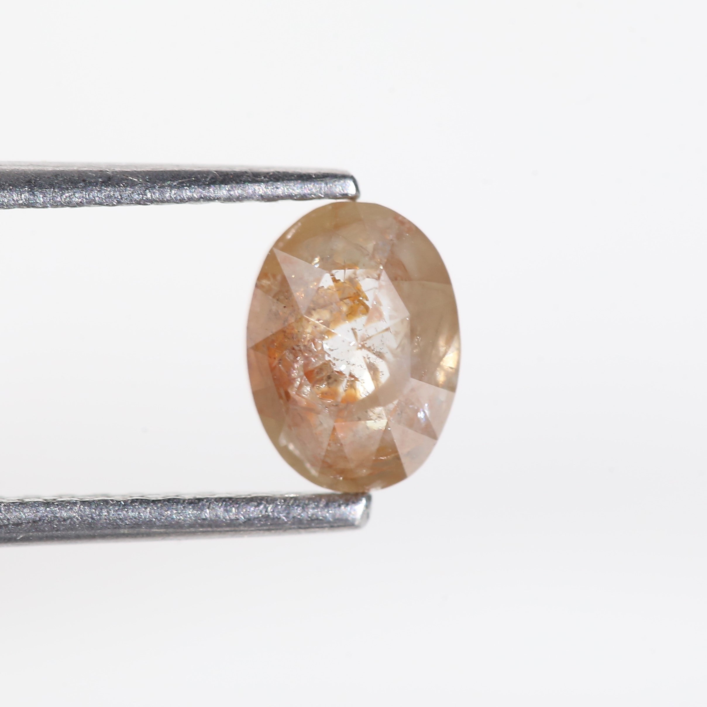 1 Carat Orange Oval Salt and Pepper Diamond 6.7 MM