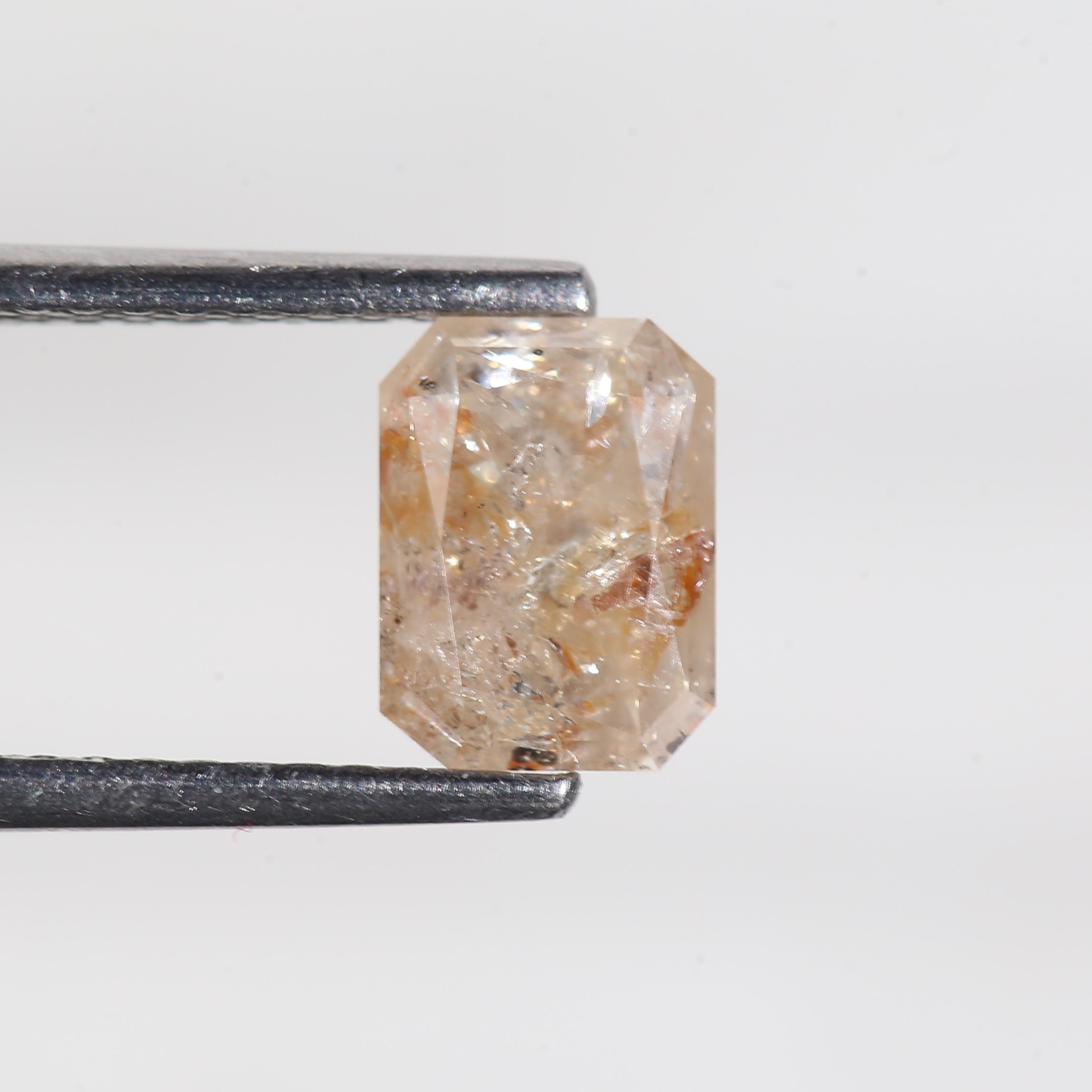 1.4 Carat Orange Emerald Cut Salt and Pepper Diamond 7 MM
