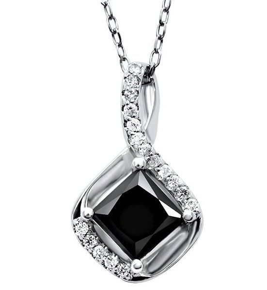 Diamond pendant with a black gemstone on a white background