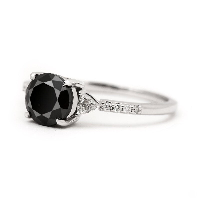 three stone black diamond ring