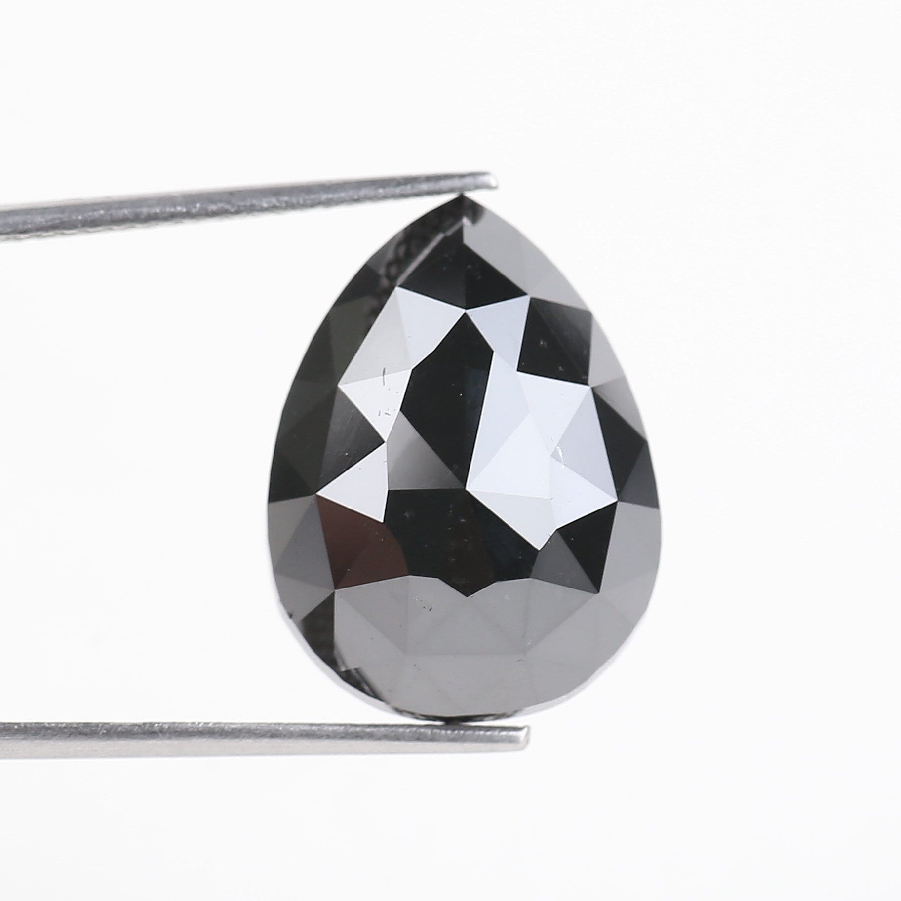 Faceted gemstone on a white background