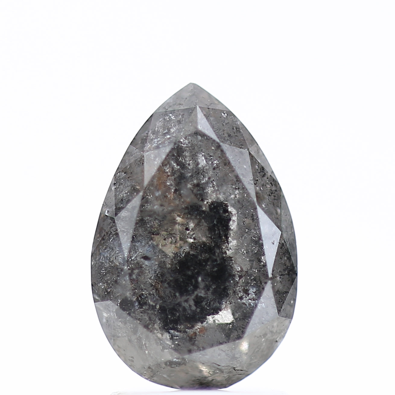 Teardrop-shaped diamond with a rough, uncut surface on a white background
