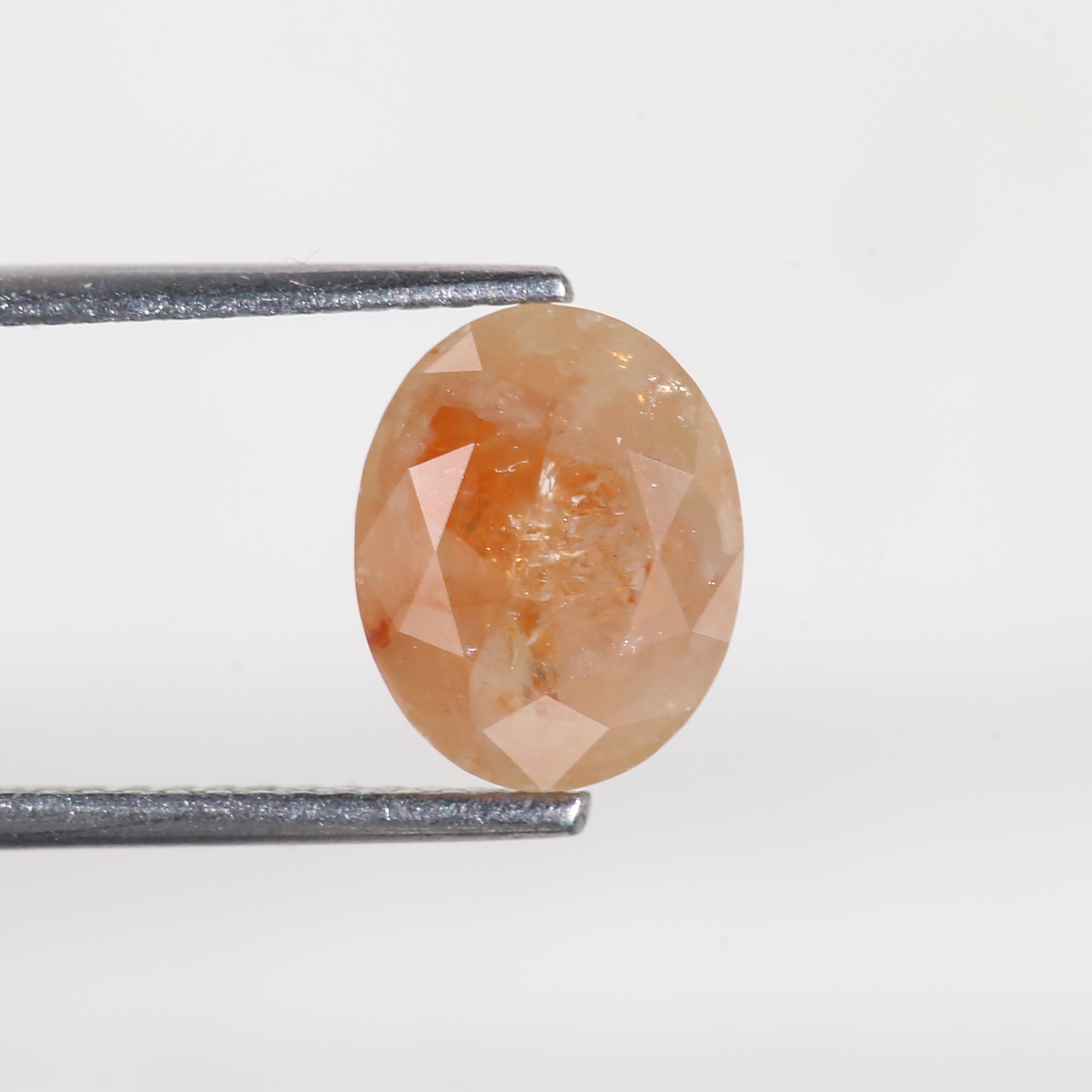 2.57 Carat Oval Cut Orange Salt and Pepper Diamond 7.4 MM