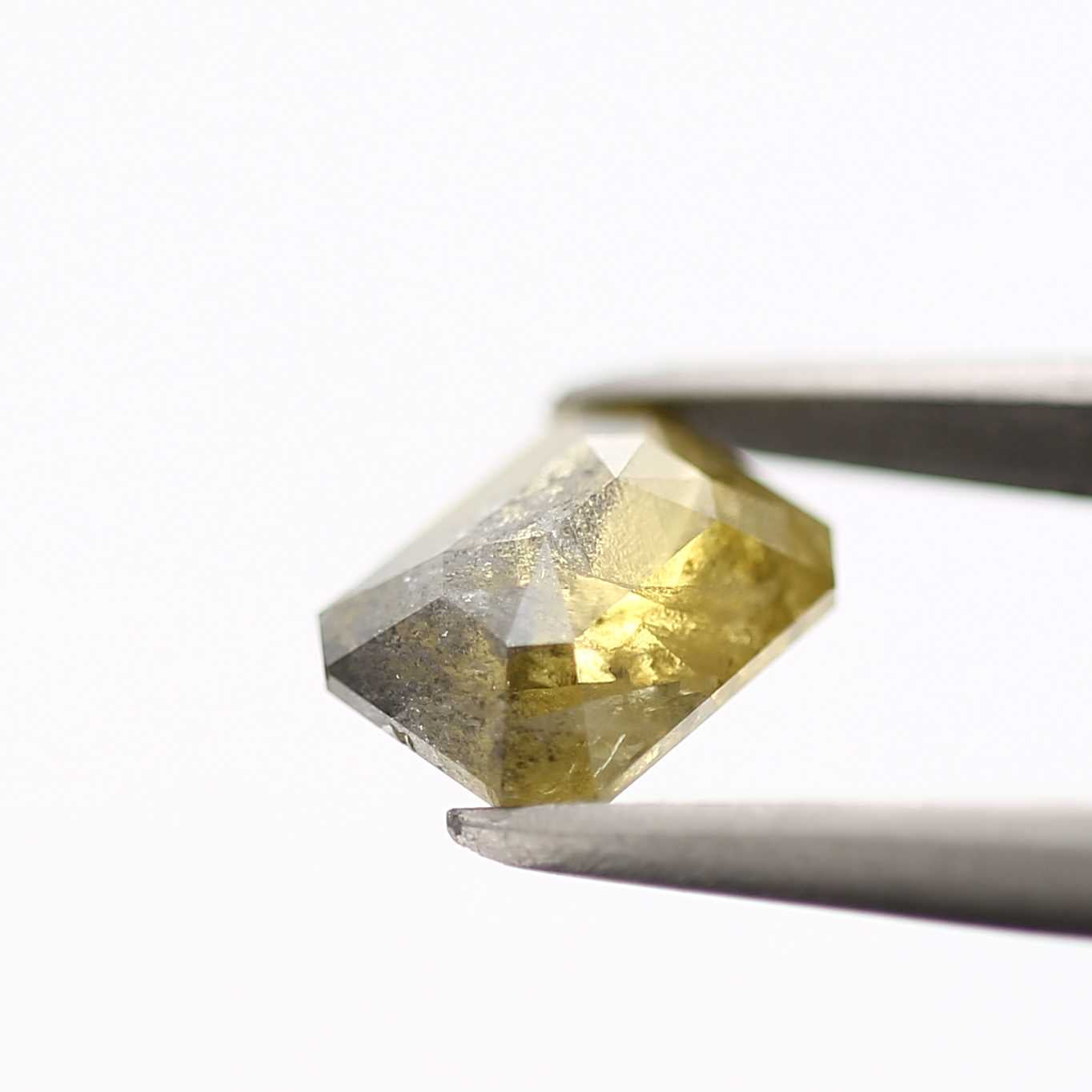 1.09 Carat 6.90 MM Fancy Rustic Yellow Emerald Cut Salt Pepper Diamond - Blackdiamond