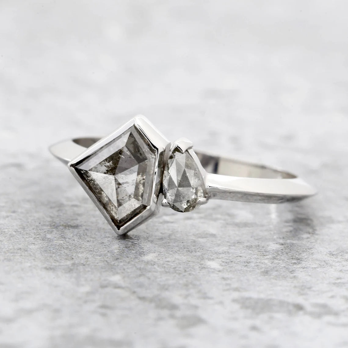 shield and pear diamond ring