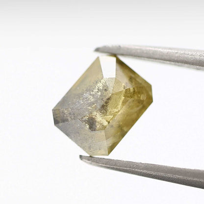 1.09 Carat 6.90 MM Fancy Rustic Yellow Emerald Cut Salt Pepper Diamond - Blackdiamond