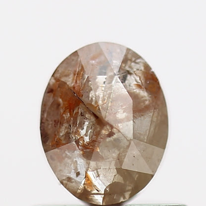 0.49 Carat Orange Salt and Pepper Oval Cut Diamond 5.70 MM