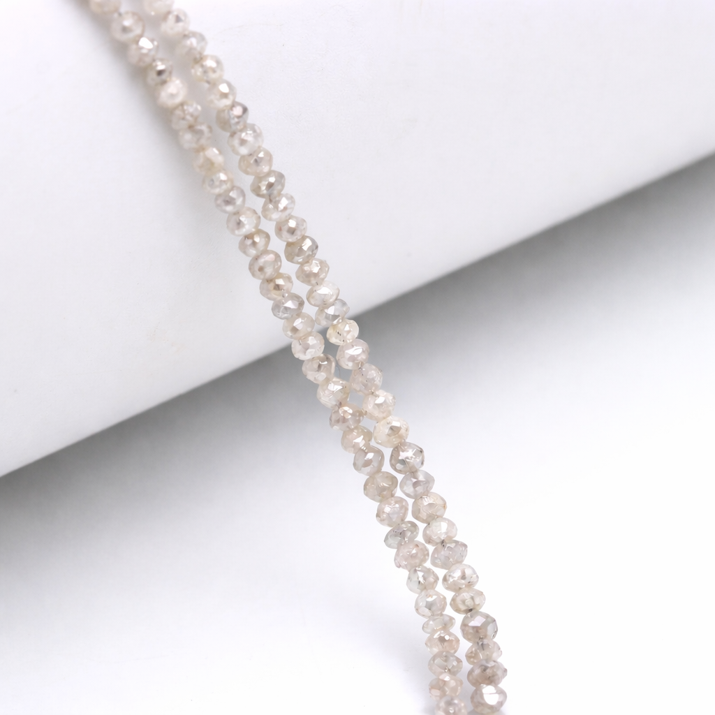 diamond white necklace on a white surface