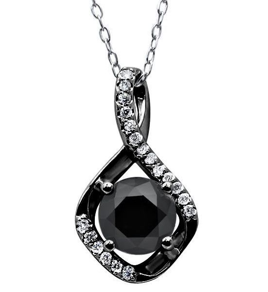 Black diamond pendant with white gemstones on a chain against a white background