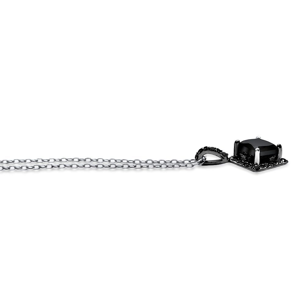 Black cube pendant on a silver chain against a white background