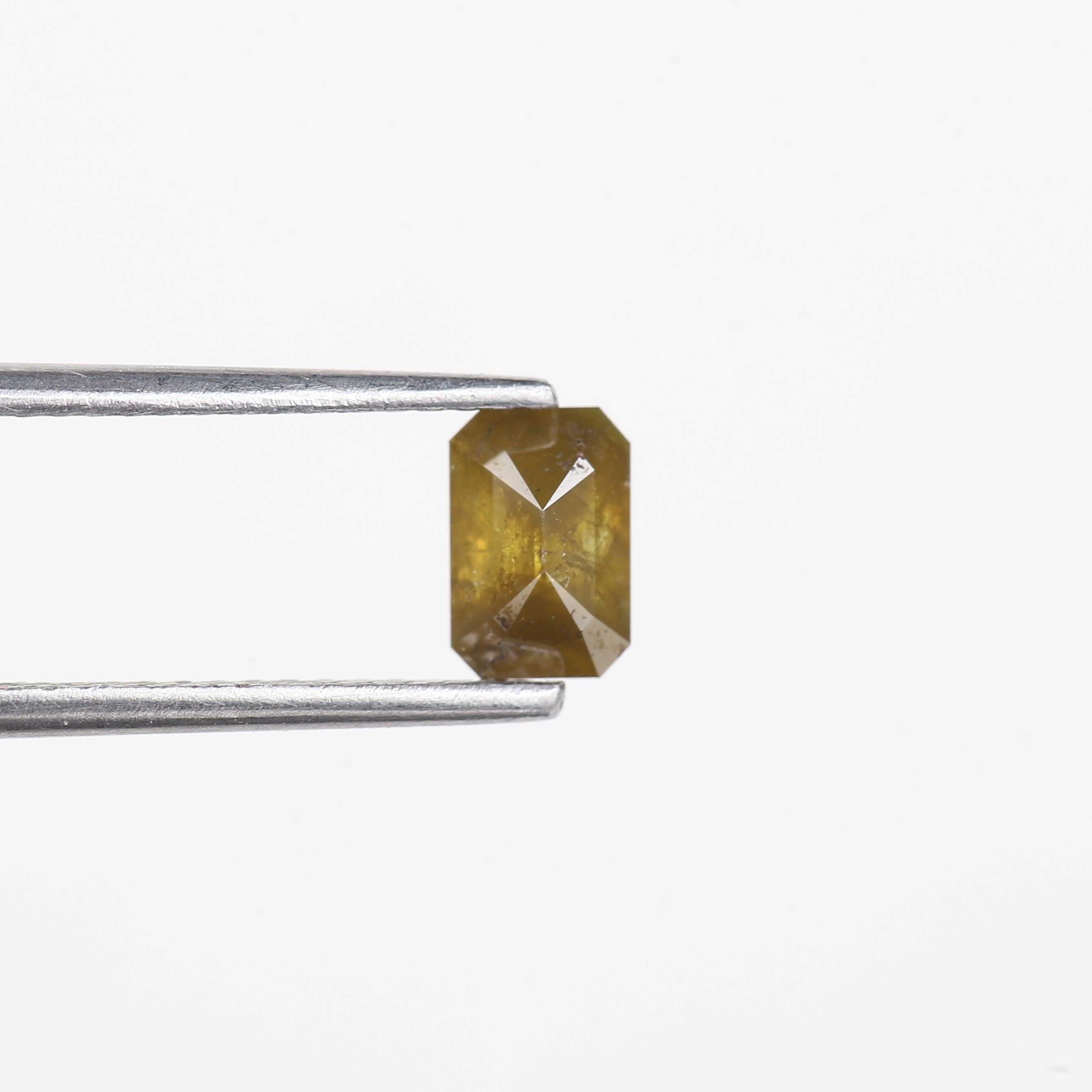 0.72 Carat Natural Yellow Emerald Cut Salt And Pepper Diamond 6.16 MM