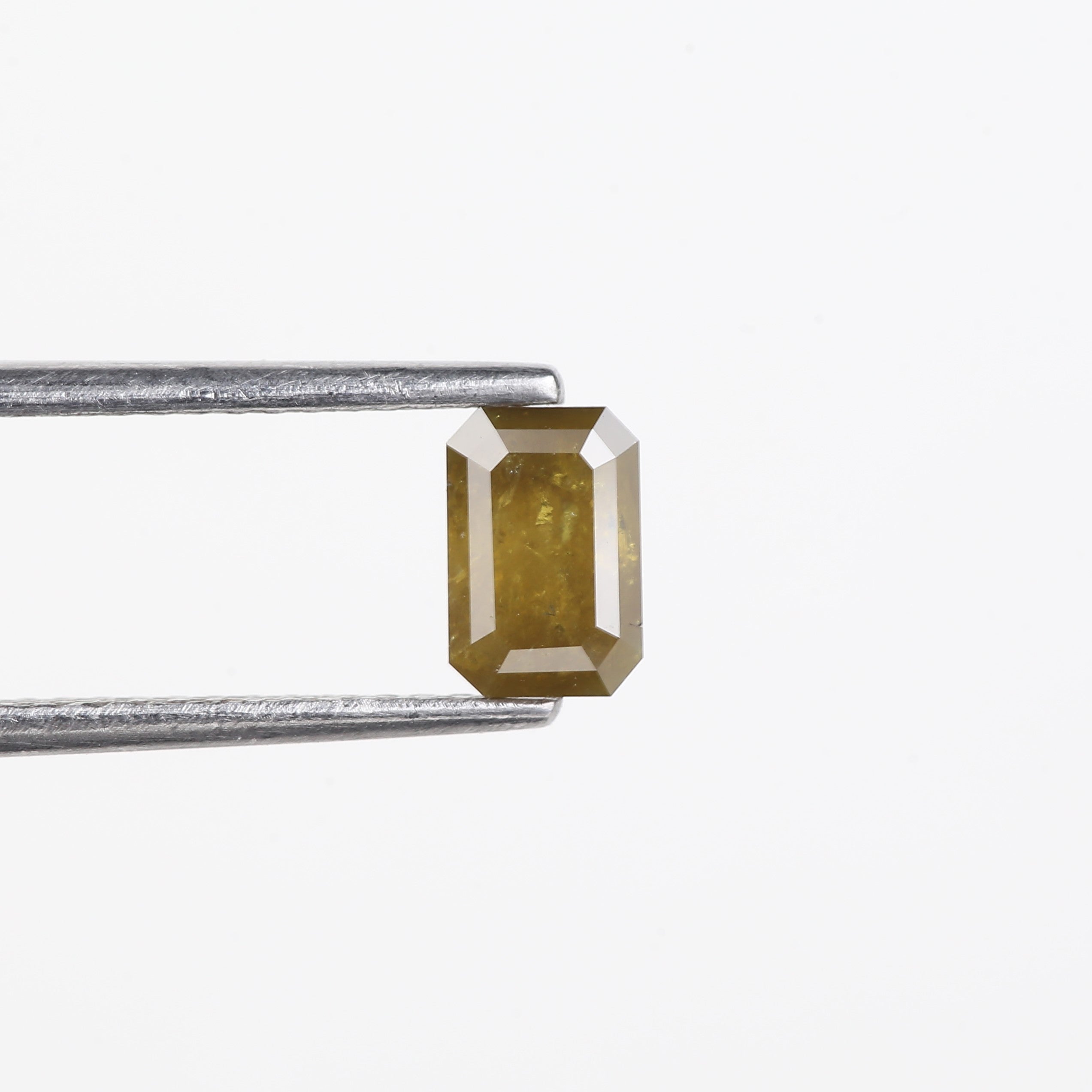 0.72 Carat Natural Yellow Emerald Cut Salt And Pepper Diamond 6.16 MM