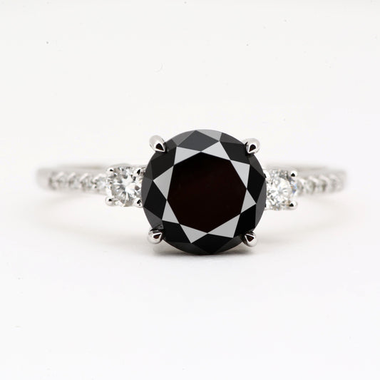 black solitaire diamond engagement ring