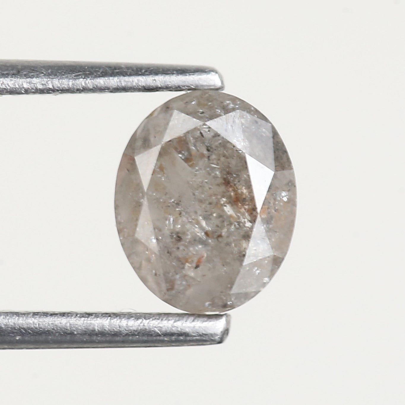 0.74 Ct Oval Cut Grey Salt and Pepper Diamond 6.2 MM