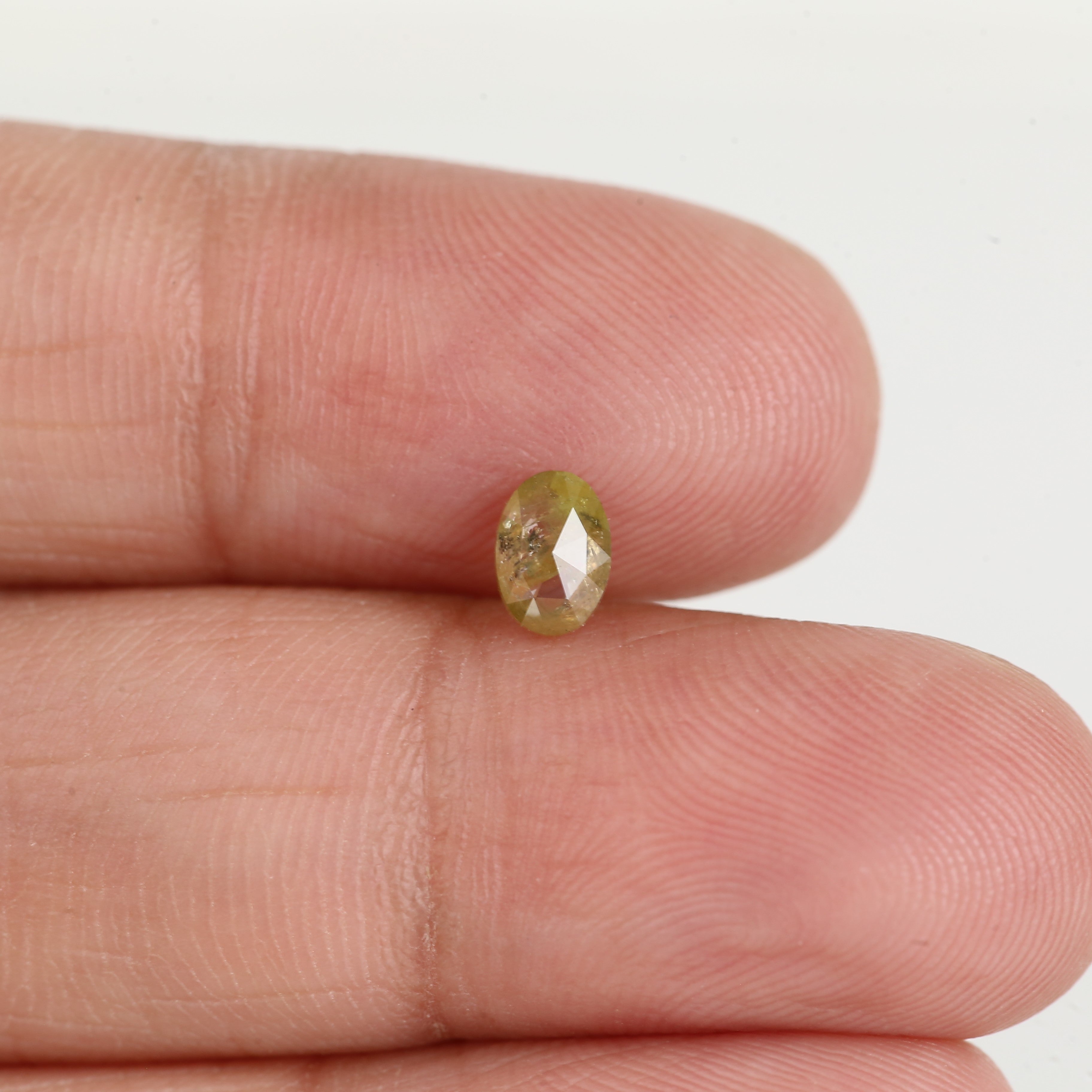0.43 Ct Oval Salt and Pepper Yellow Natural Diamond 5.6 MM