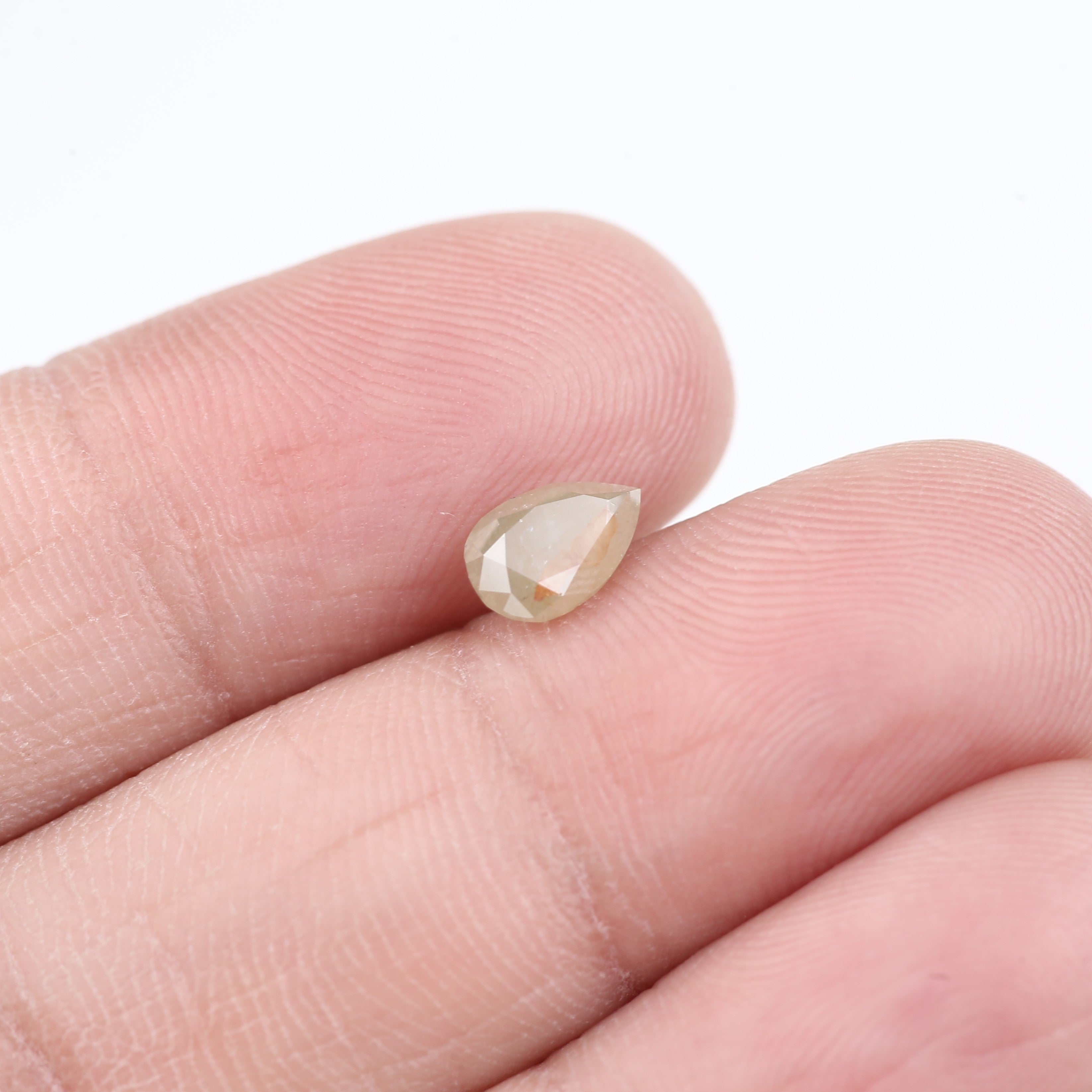 0.81 Carat Natural Yellow Orange Pear Salt and Pepper Diamond 7.10 MM