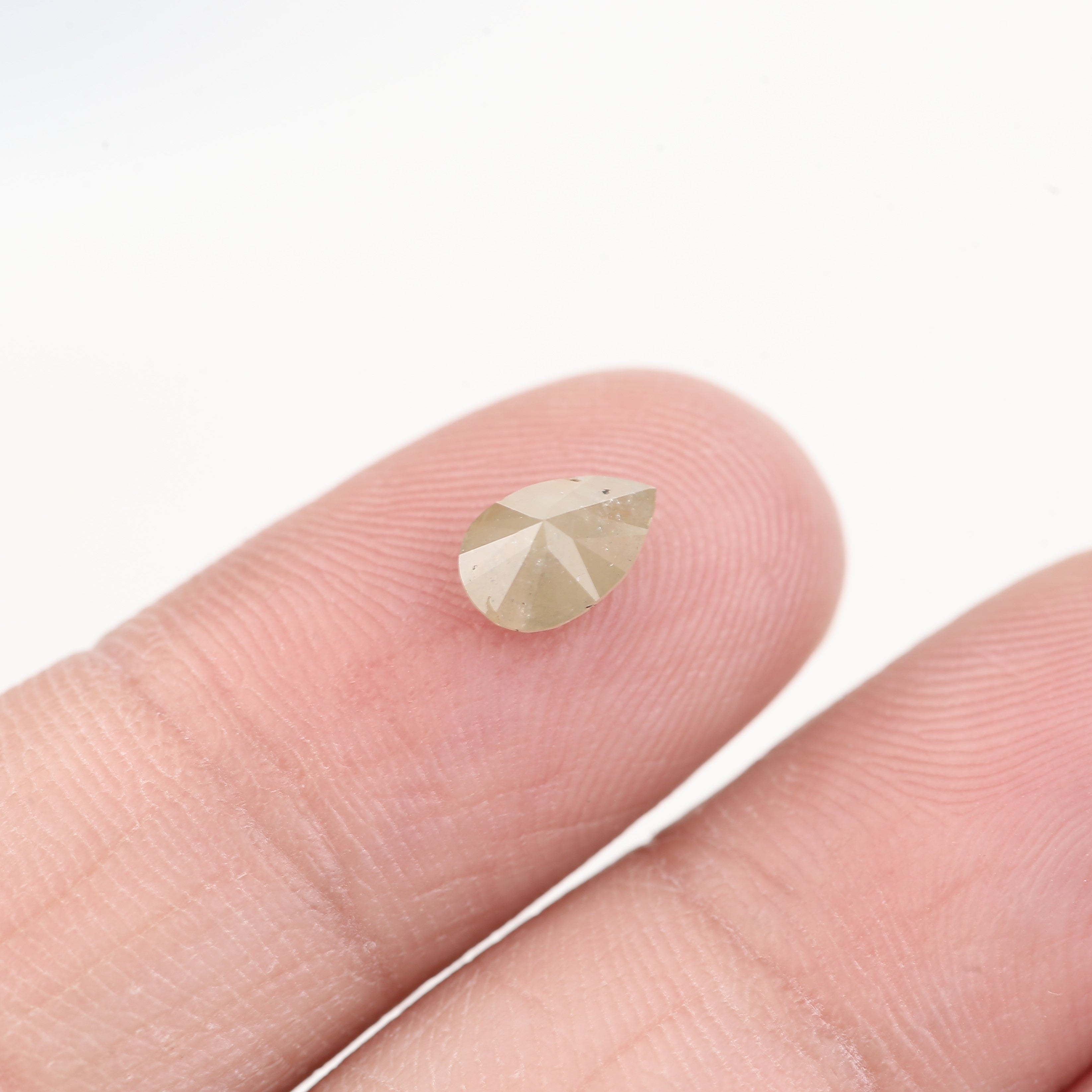 0.81 Carat Natural Yellow Orange Pear Salt and Pepper Diamond 7.10 MM