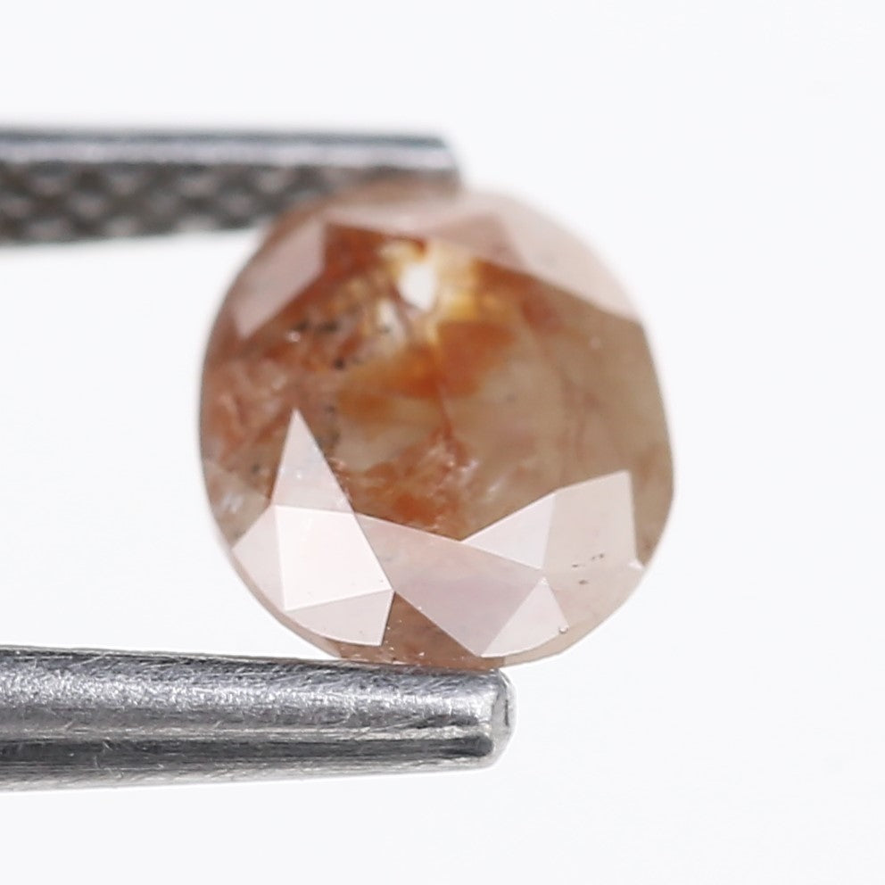 0.76 Carat Natural Orange Oval Cut Salt and Pepper Diamond 7.13 MM