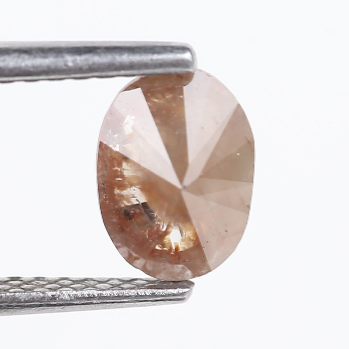 0.76 Carat Natural Orange Oval Cut Salt and Pepper Diamond 7.13 MM