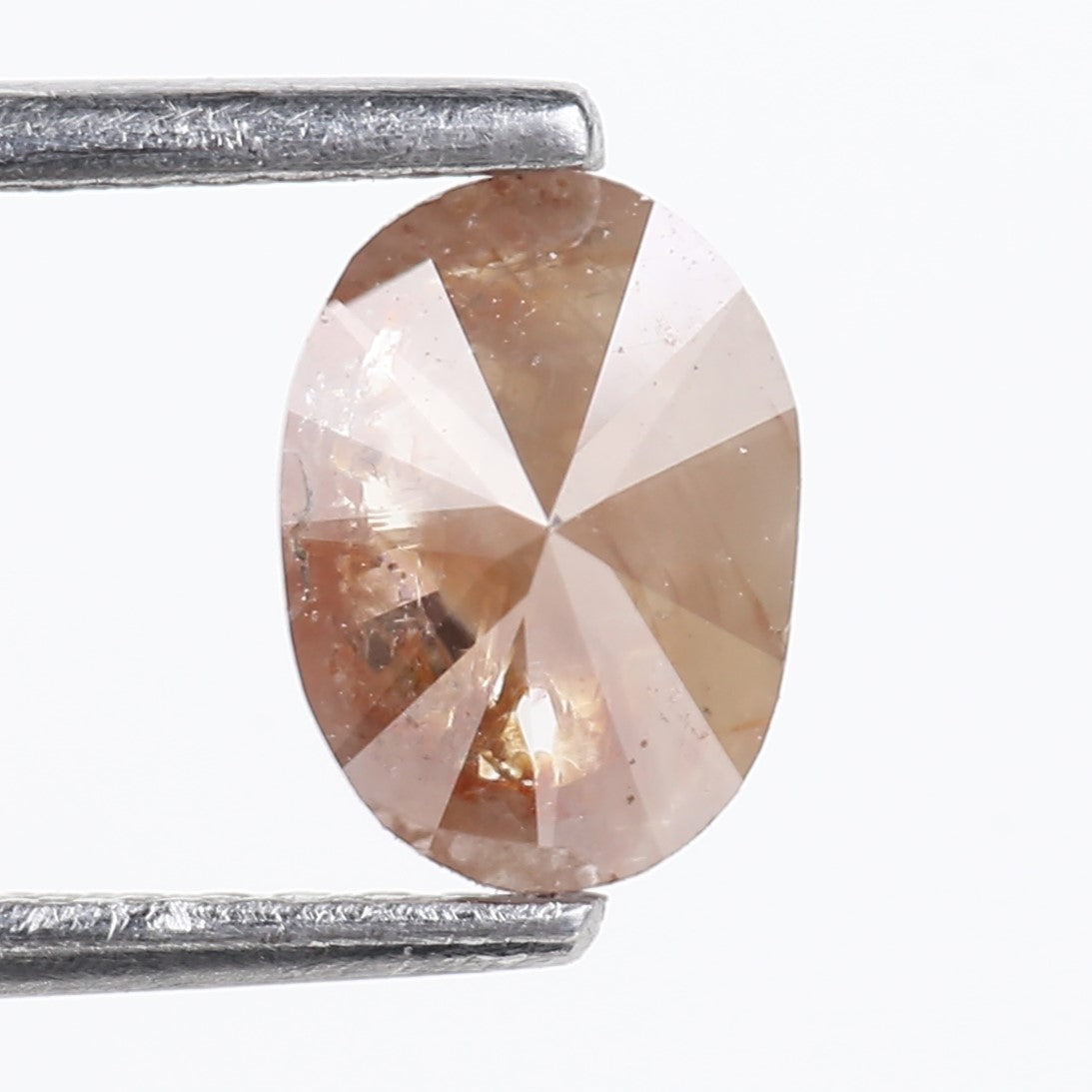 0.76 Carat Natural Orange Oval Cut Salt and Pepper Diamond 7.13 MM