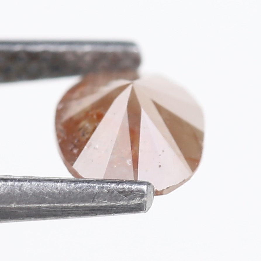 0.76 Carat Natural Orange Oval Cut Salt and Pepper Diamond 7.13 MM