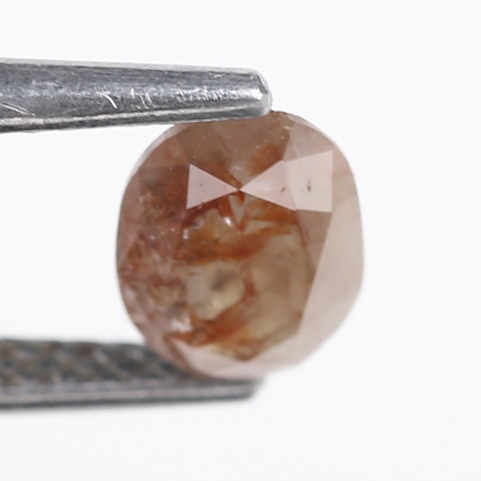 0.76 Carat Natural Orange Oval Cut Salt and Pepper Diamond 7.13 MM