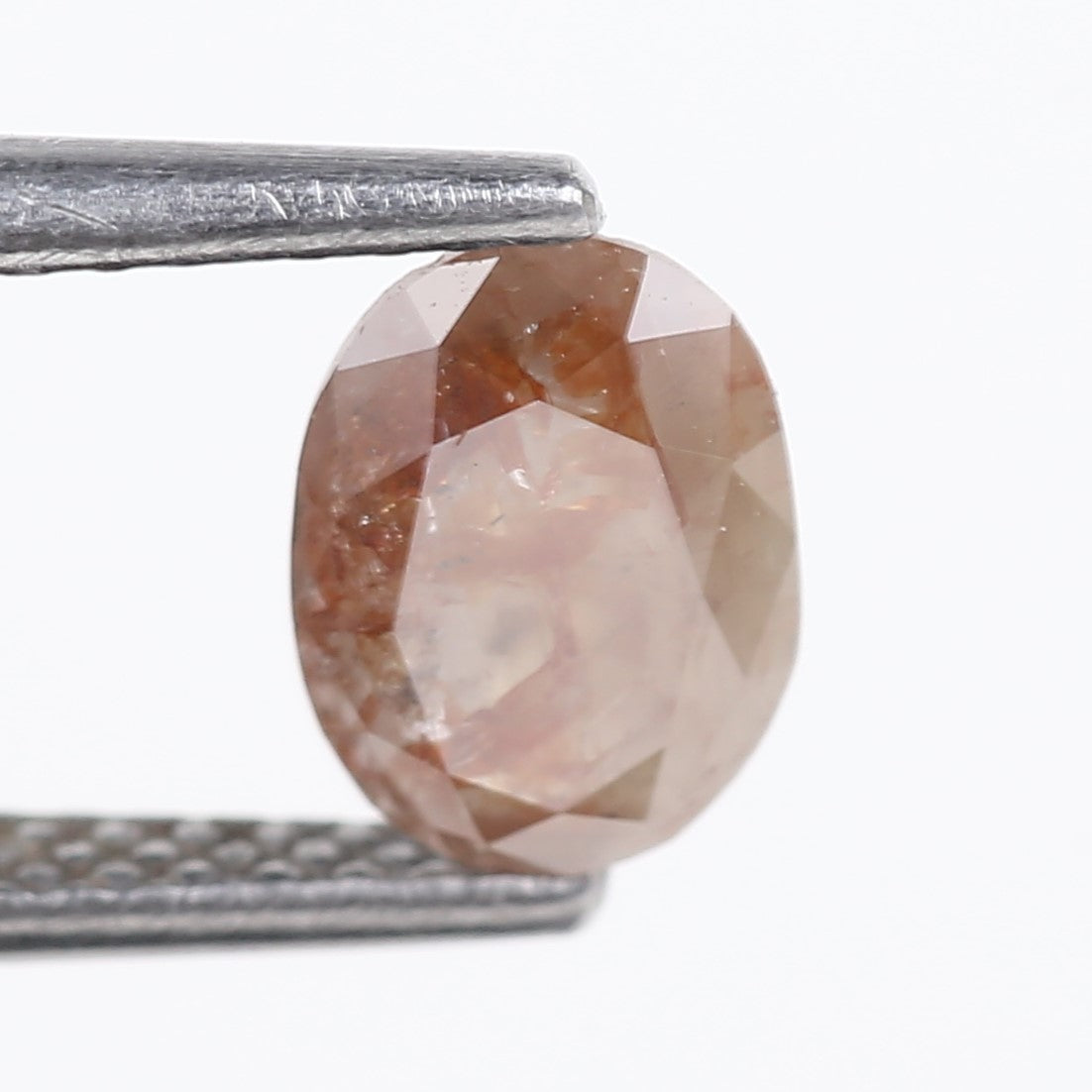 0.76 Carat Natural Orange Oval Cut Salt and Pepper Diamond 7.13 MM