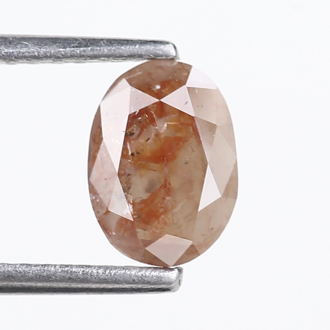 0.76 Carat Natural Orange Oval Cut Salt and Pepper Diamond 7.13 MM