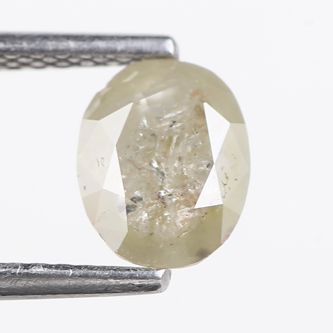 0.93 Carat Natural Salt And Pepper Diamond Oval Cut 7.17 MM