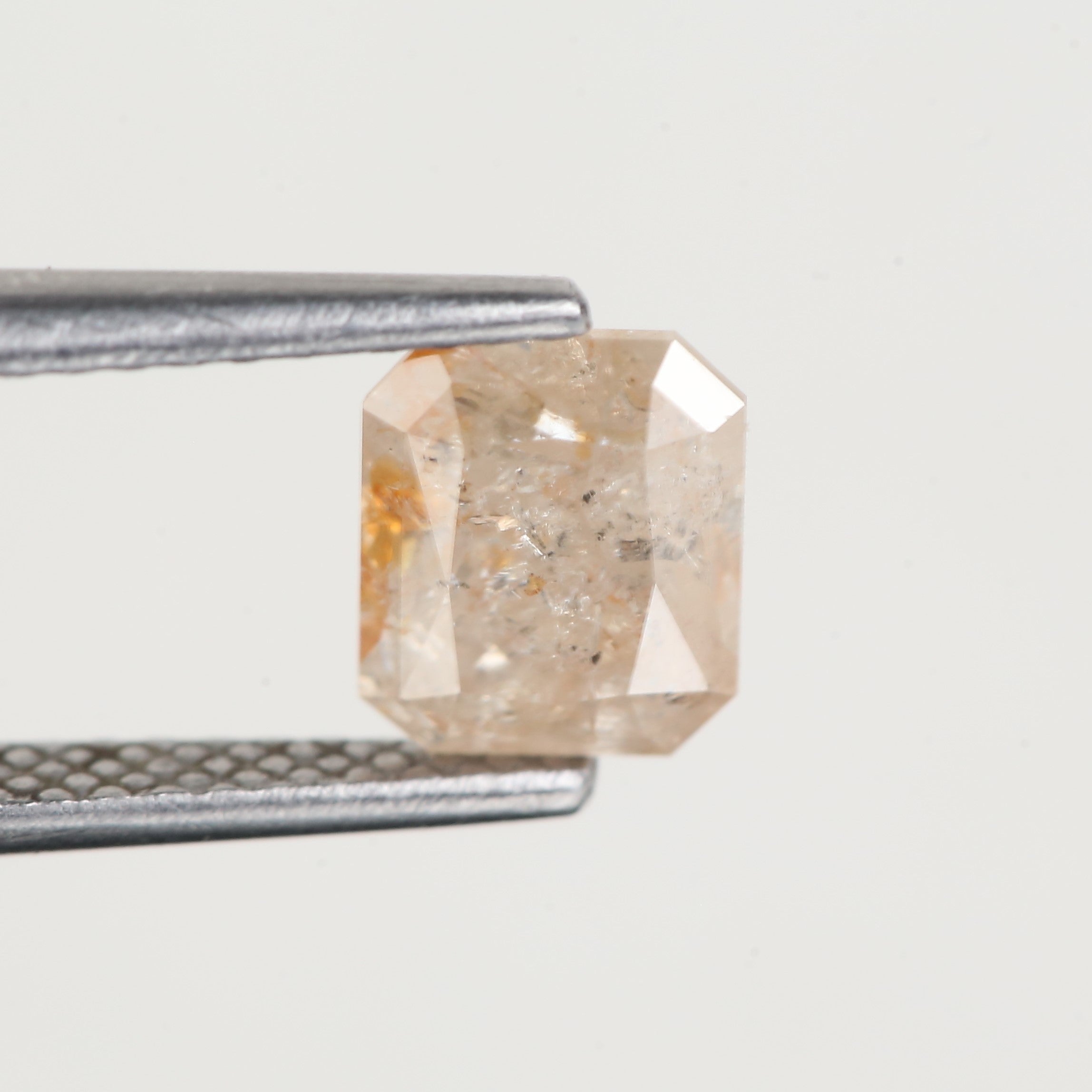 1.34 Carat Natural Orange Emerald Cut Salt and Pepper Diamond 6.6 MM