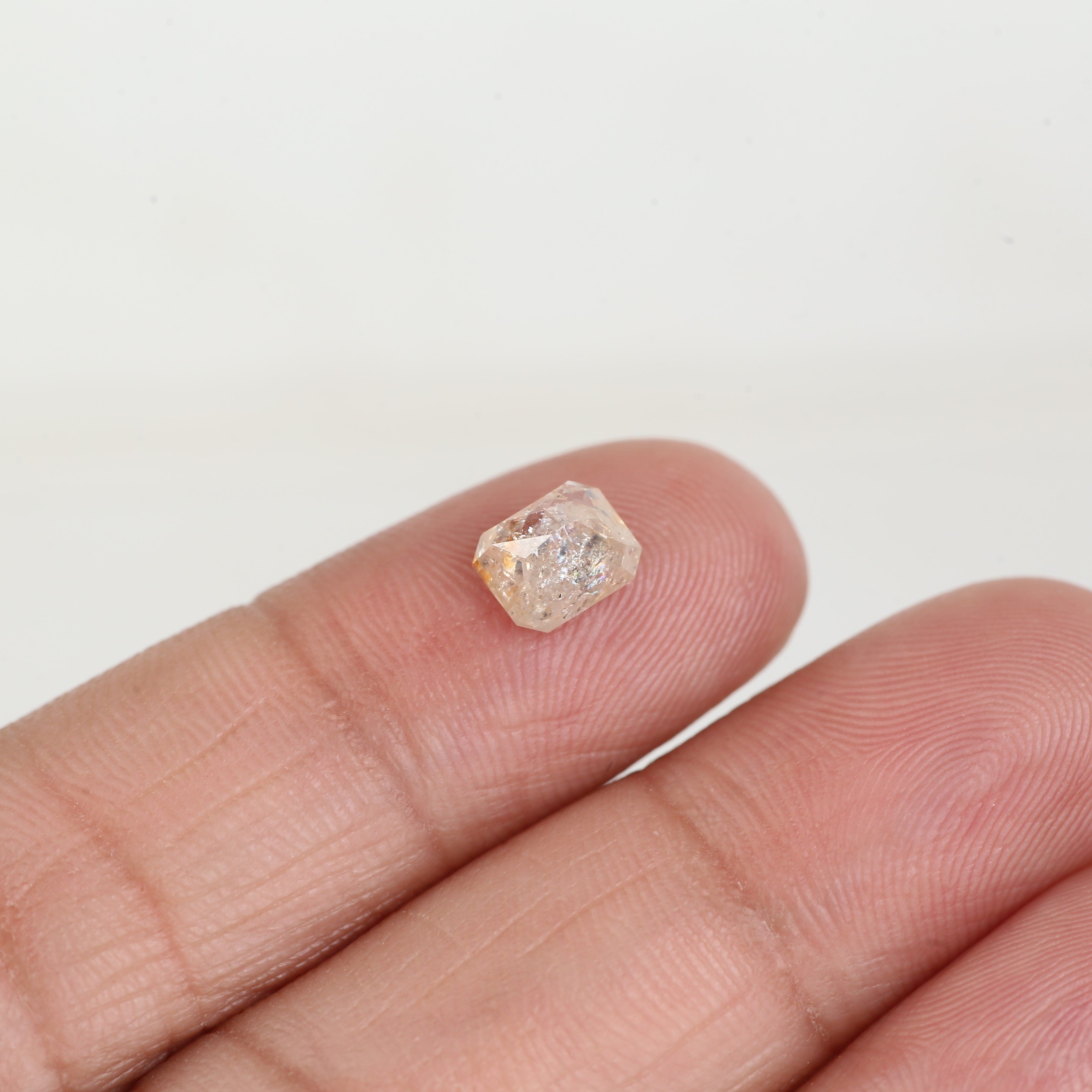 1.34 Carat Natural Orange Emerald Cut Salt and Pepper Diamond 6.6 MM