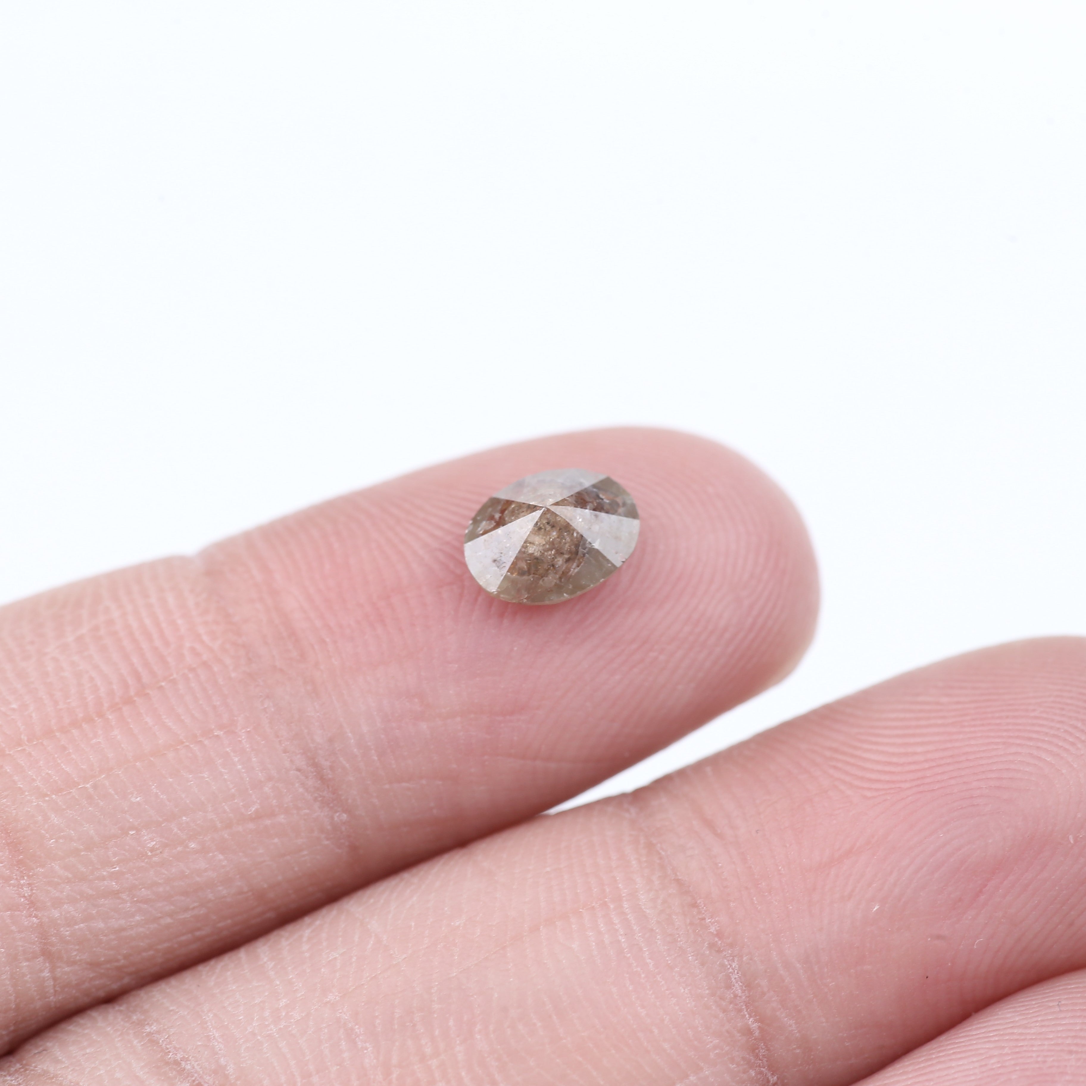 0.91 Carat Natural Salt And Pepper Reddish Brown Oval Cut Diamond 7.00 MM