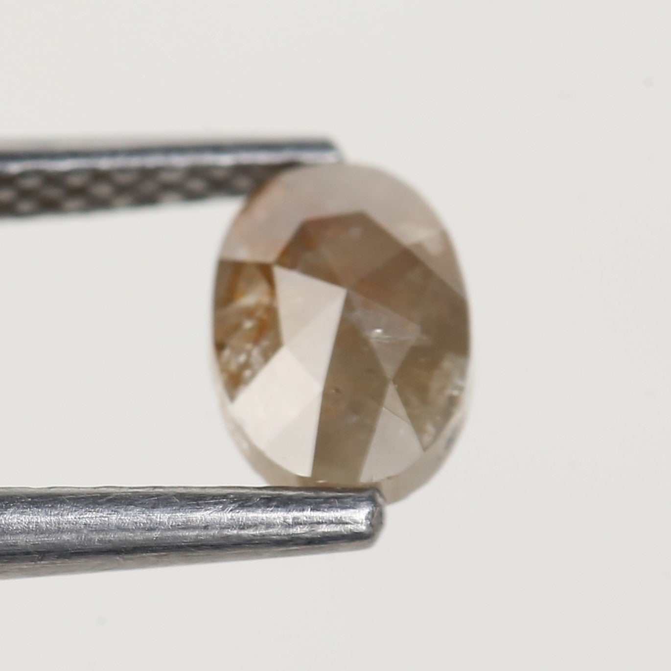 0.55 Carat Oval Rose Cut Salt and Pepper Diamond 6.3 MM