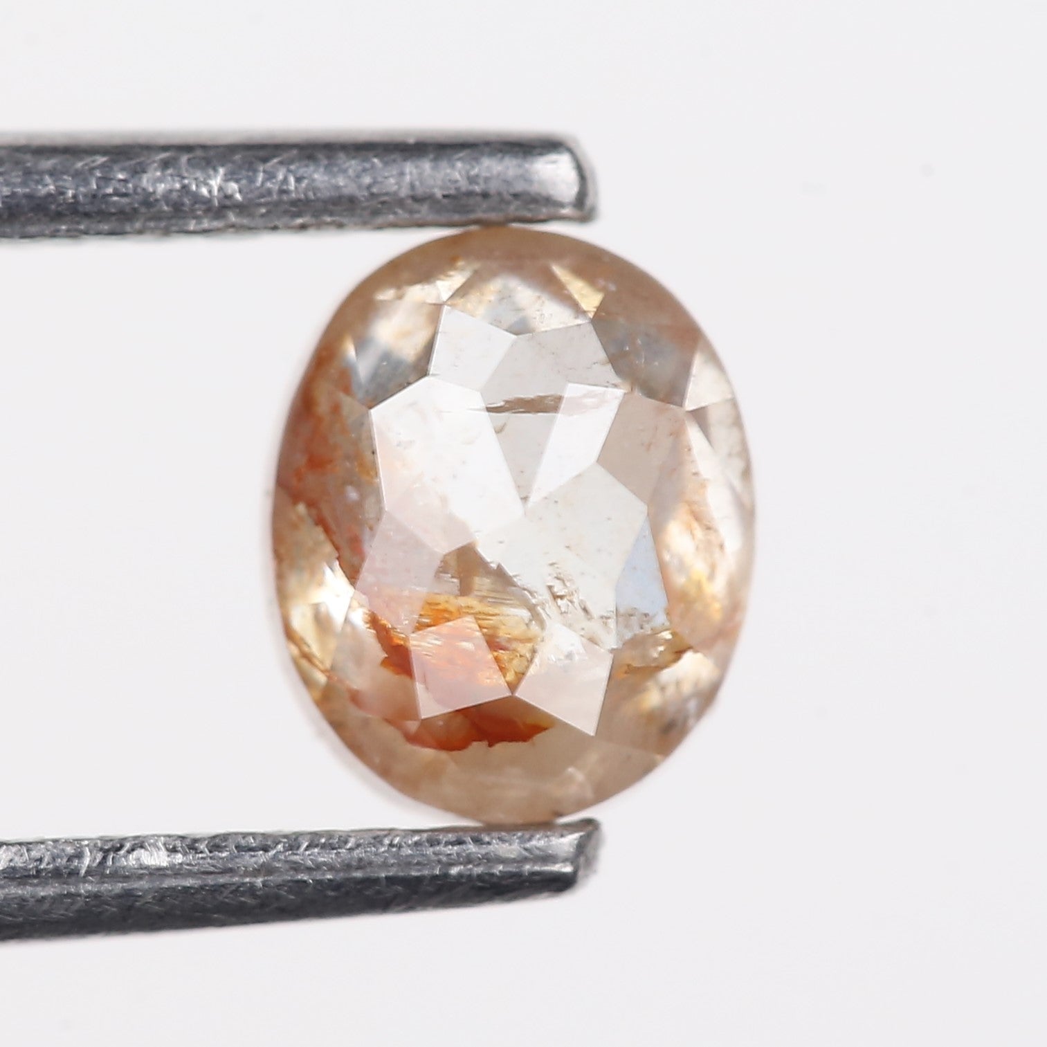 0.69 Carat Natural Orange Salt Pepper Oval Rosecut Diamond 5.62 MM