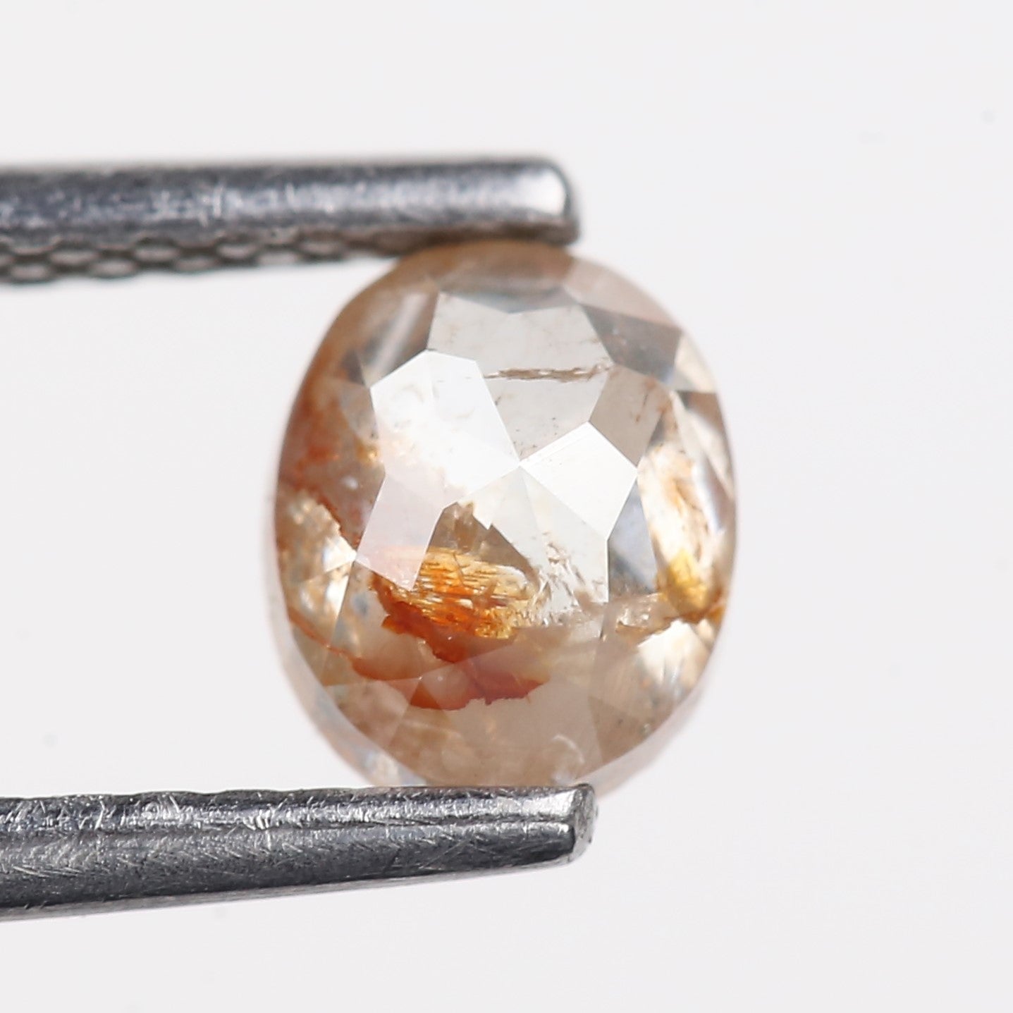 0.69 Carat Natural Orange Salt Pepper Oval Rosecut Diamond 5.62 MM