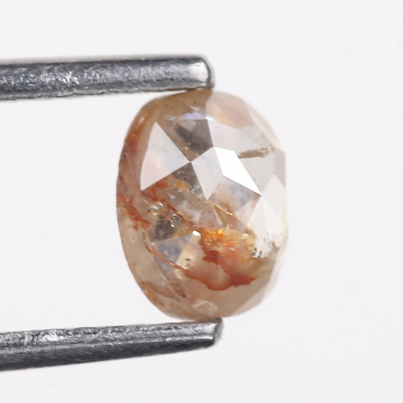 0.69 Carat Natural Orange Salt Pepper Oval Rosecut Diamond 5.62 MM