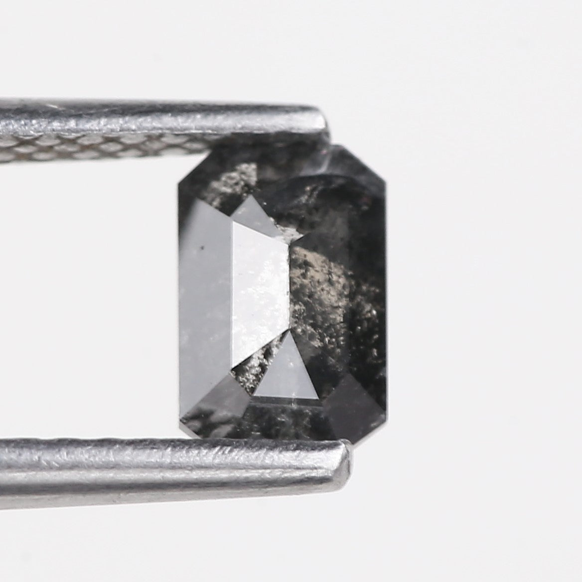 0.64 Carat Natural Fancy Black Emerald Cut Salt and Pepper Diamond 6 MM