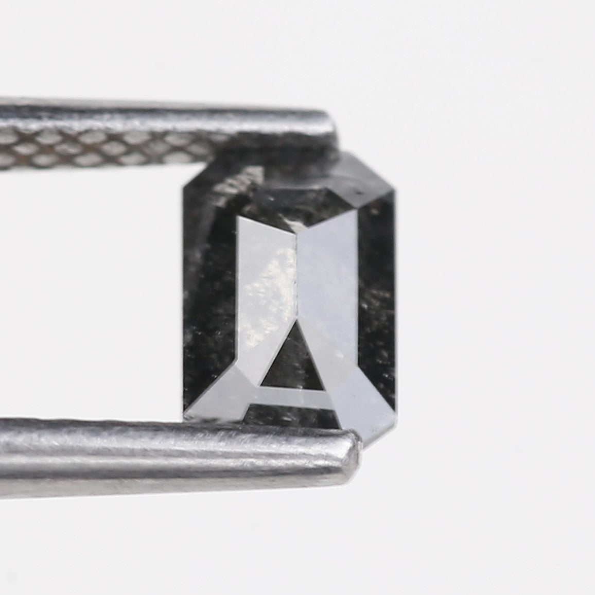 0.64 Carat Natural Fancy Black Emerald Cut Salt and Pepper Diamond 6 MM