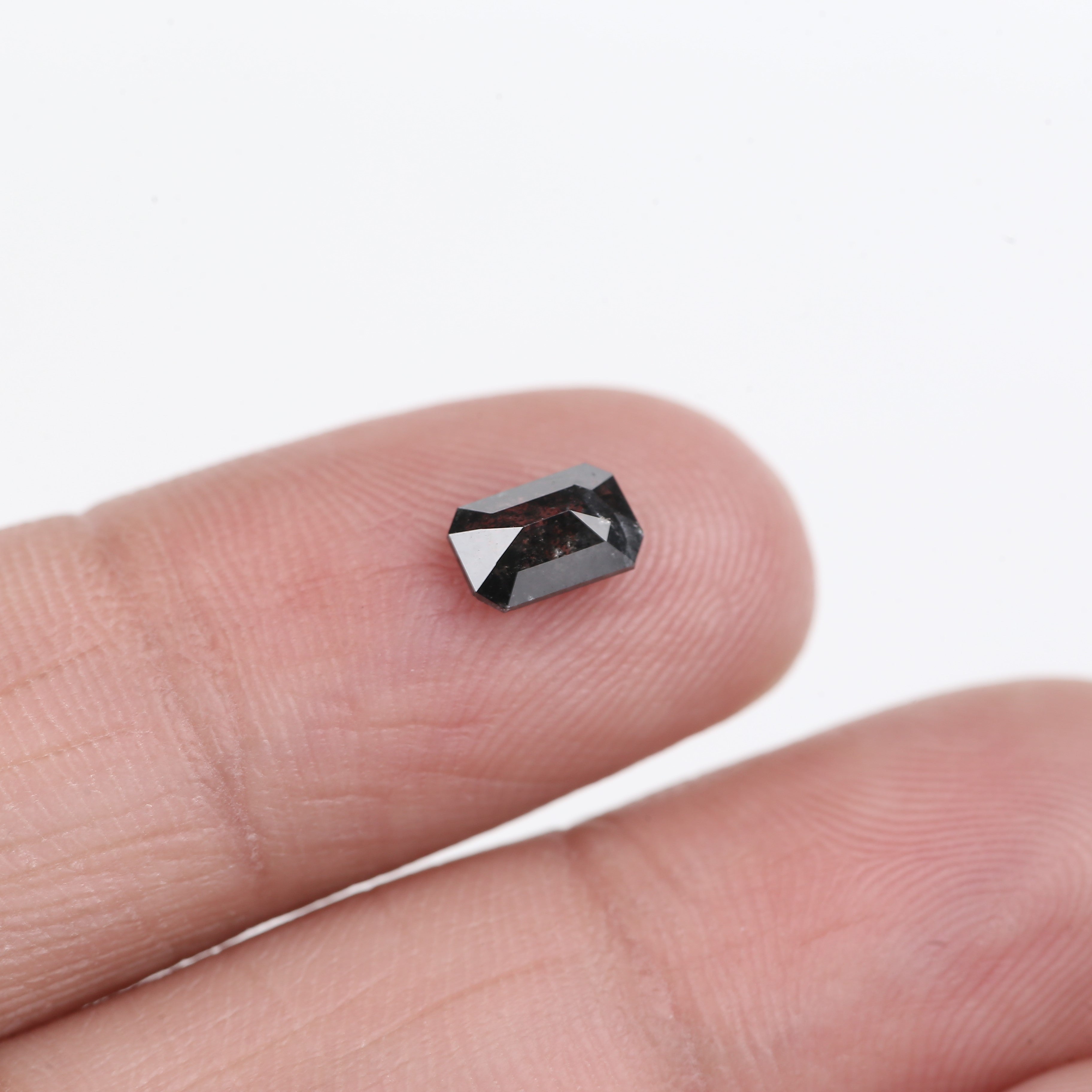 0.64 Carat Natural Fancy Black Emerald Cut Salt and Pepper Diamond 6 MM