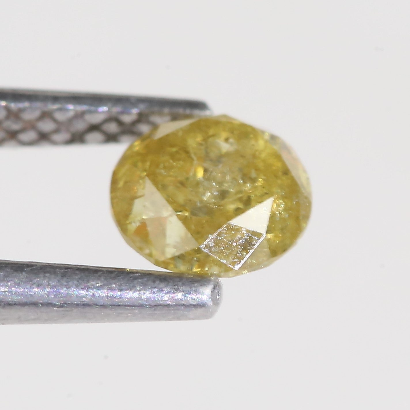 0.59 Carat Natural Salt And Pepper Round Cut Yellow Diamond 4.97 MM