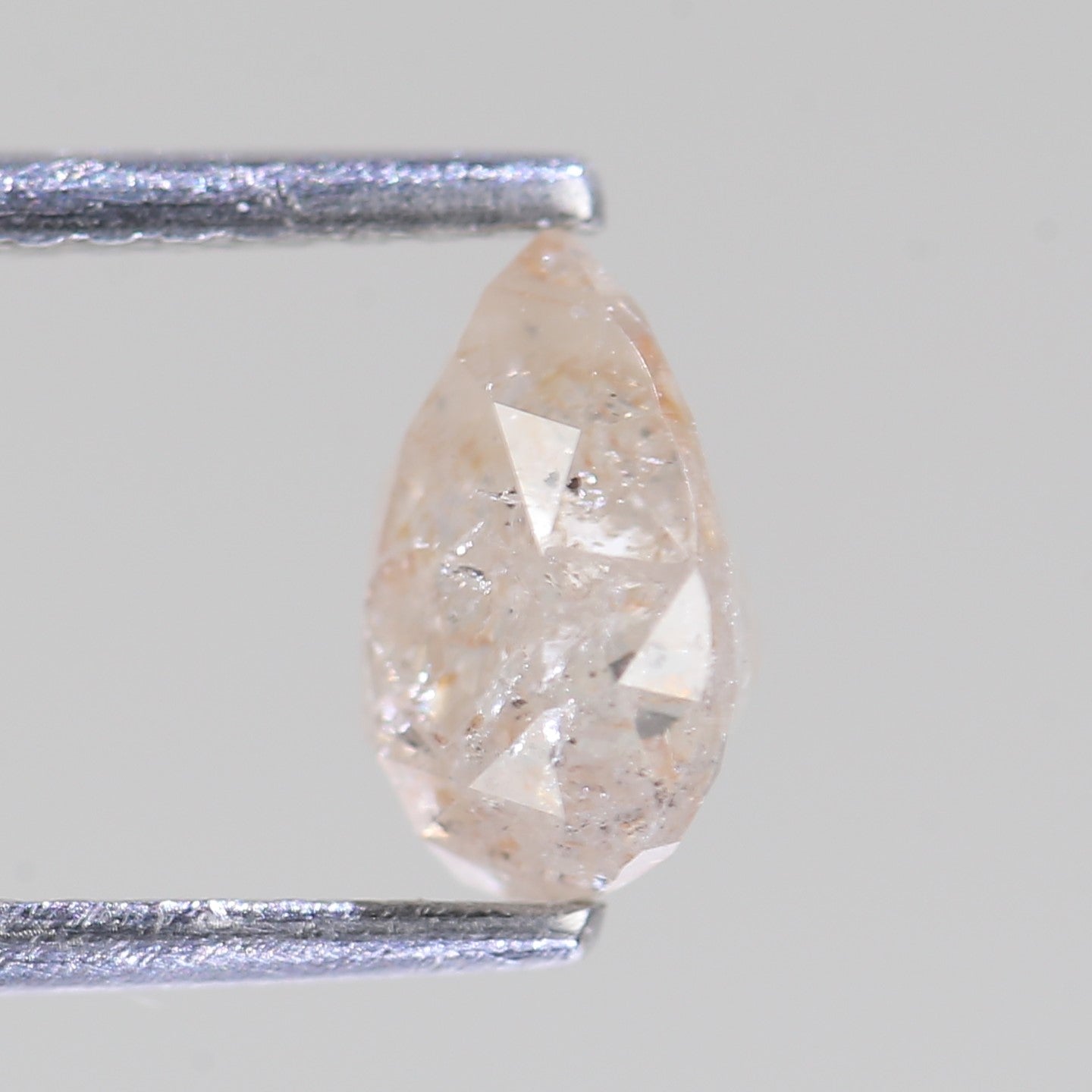 1.12 Carat Natural Pear Light Peach Salt And Pepper Diamond 7.31 MM