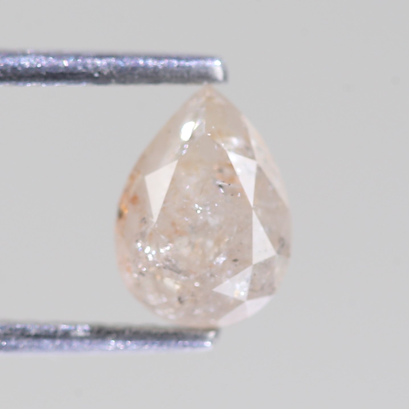 1.12 Carat Natural Pear Light Peach Salt And Pepper Diamond 7.31 MM