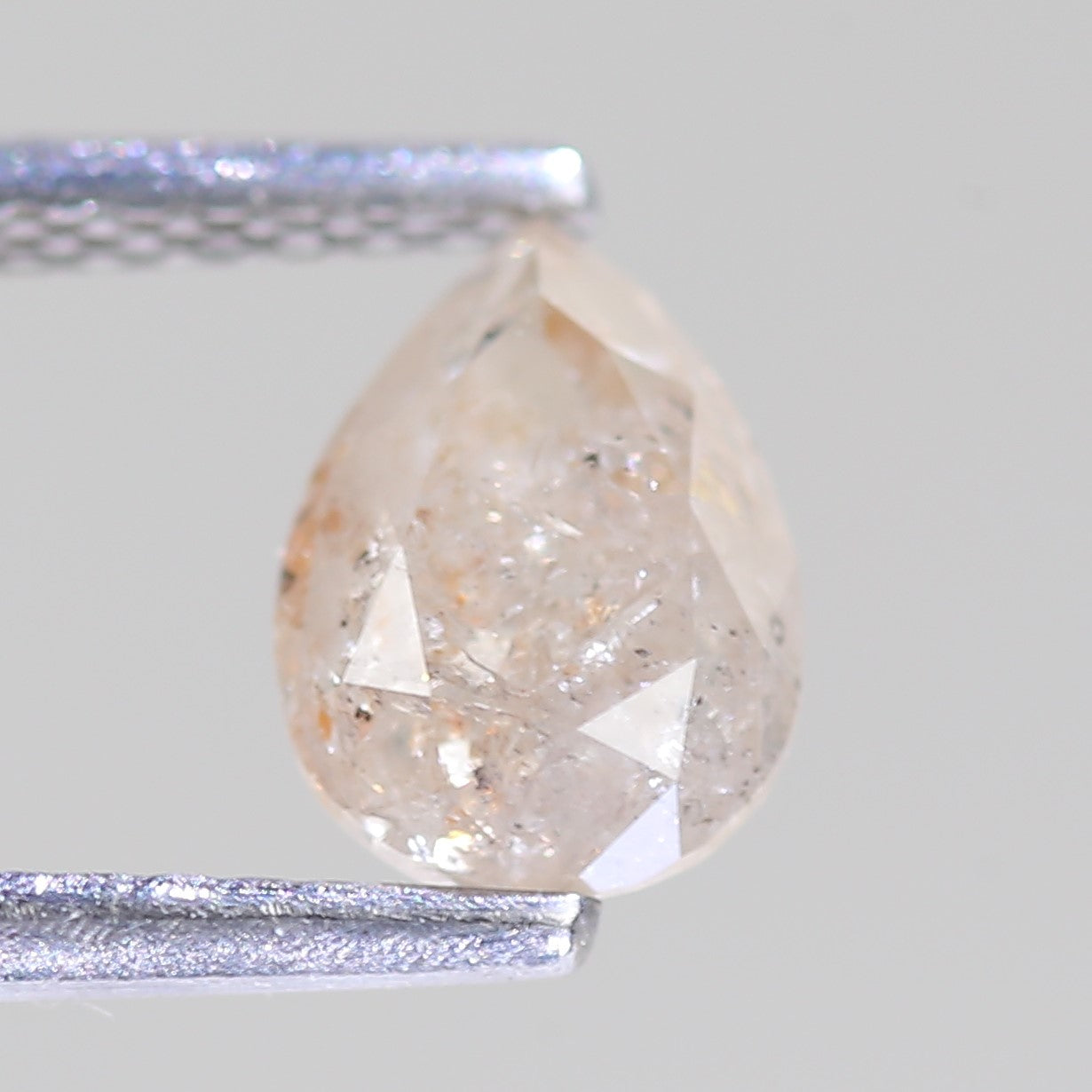 1.12 Carat Natural Pear Light Peach Salt And Pepper Diamond 7.31 MM