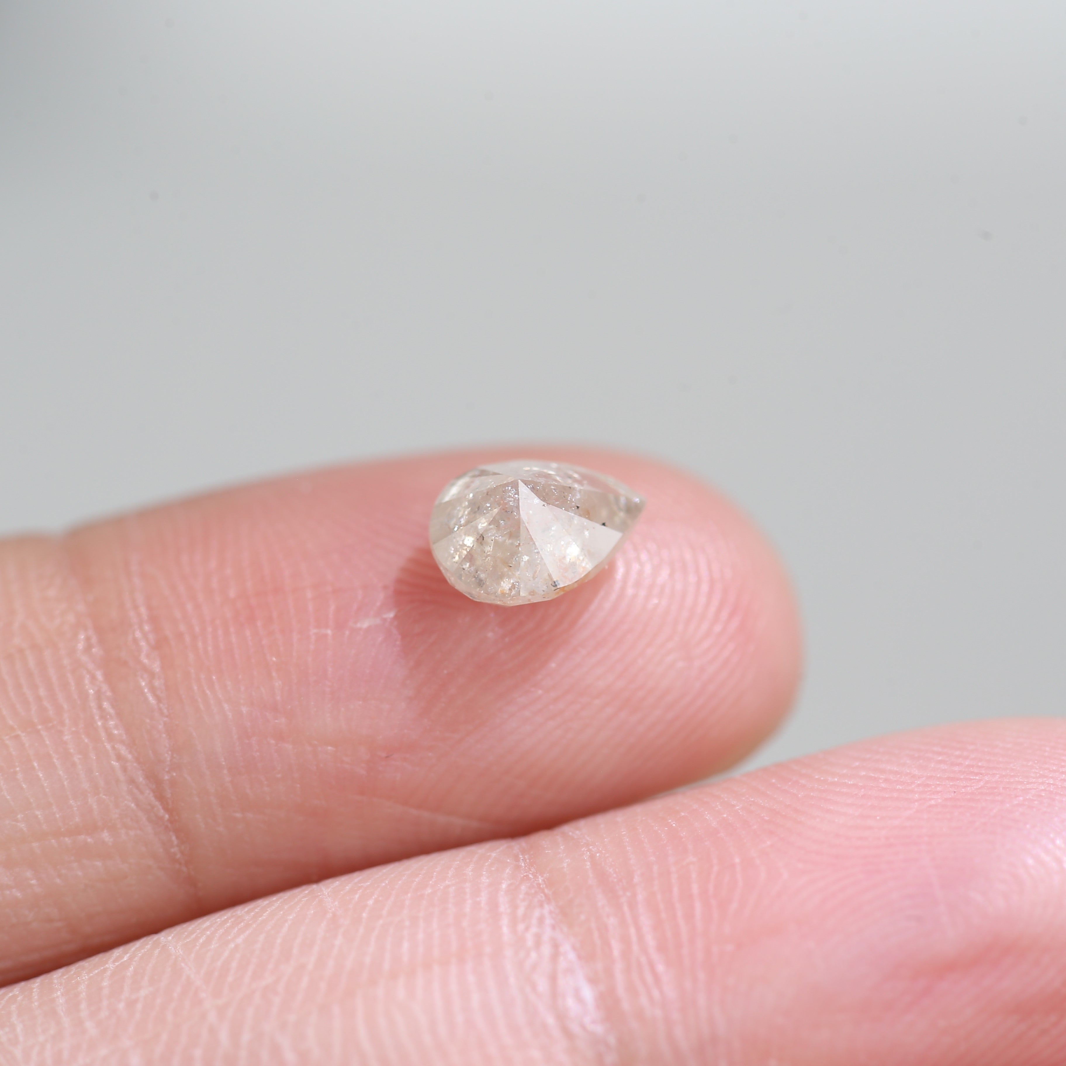 1.12 Carat Natural Pear Light Peach Salt And Pepper Diamond 7.31 MM